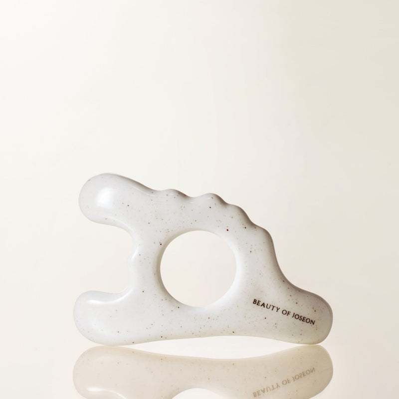 Porcelain Gwalsa (Gua Sha) — official product photograph; package size unconfirmed